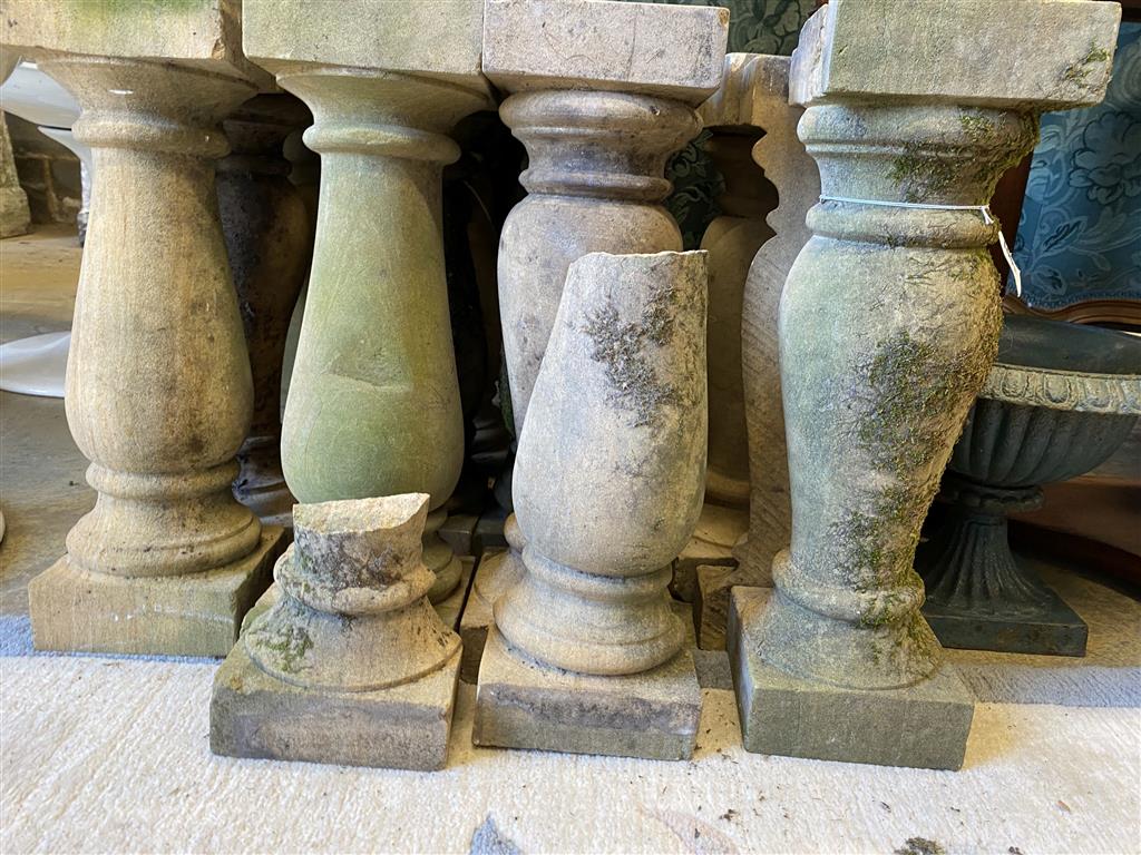 Fourteen terracotta baluster pillars, height 48cm